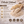 Colloidal oatmeal with a wooden scoop on a textured surface, featuring benefits text.